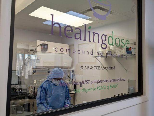 Compounding Pharmacy Technician Working in Cleanroom