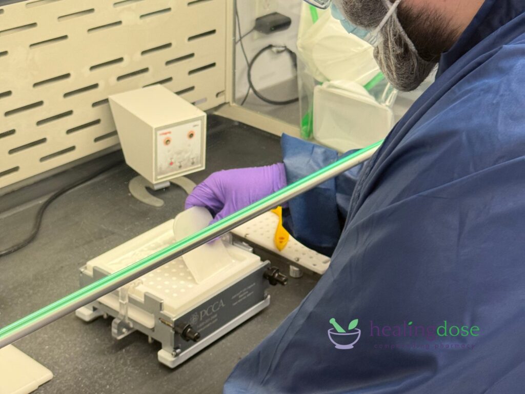Pharmacist Preparing Compounded Medication in Laboratory Setting