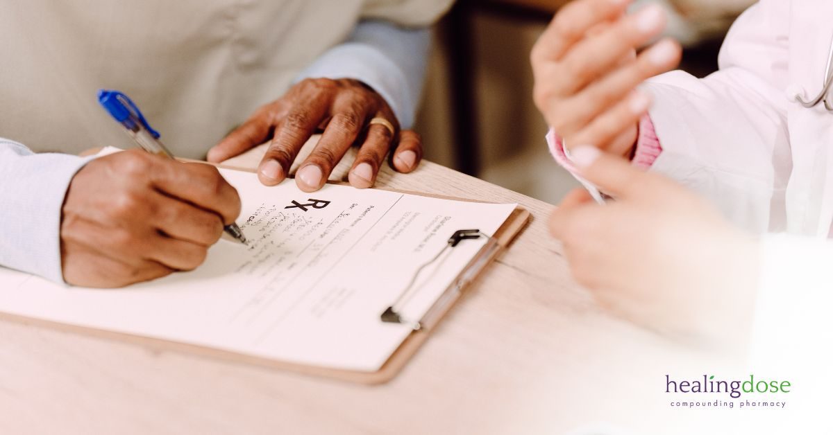 Doctor handing out a prescription